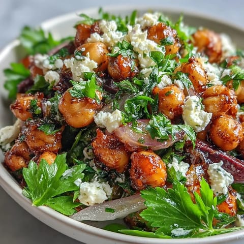 A chilled serving of Divorce Salad with crumbled feta and fresh herbs, perfect for meal prep lunches.