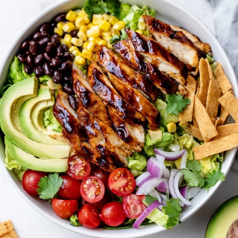 A fresh drizzle of zesty honey-lime dressing ties together this colorful, gluten-free taco salad perfect for summer.